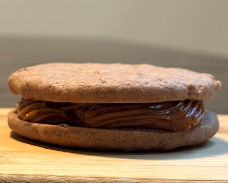 The OG alfajor: two soft cookies with a thick layer of dulce de leche